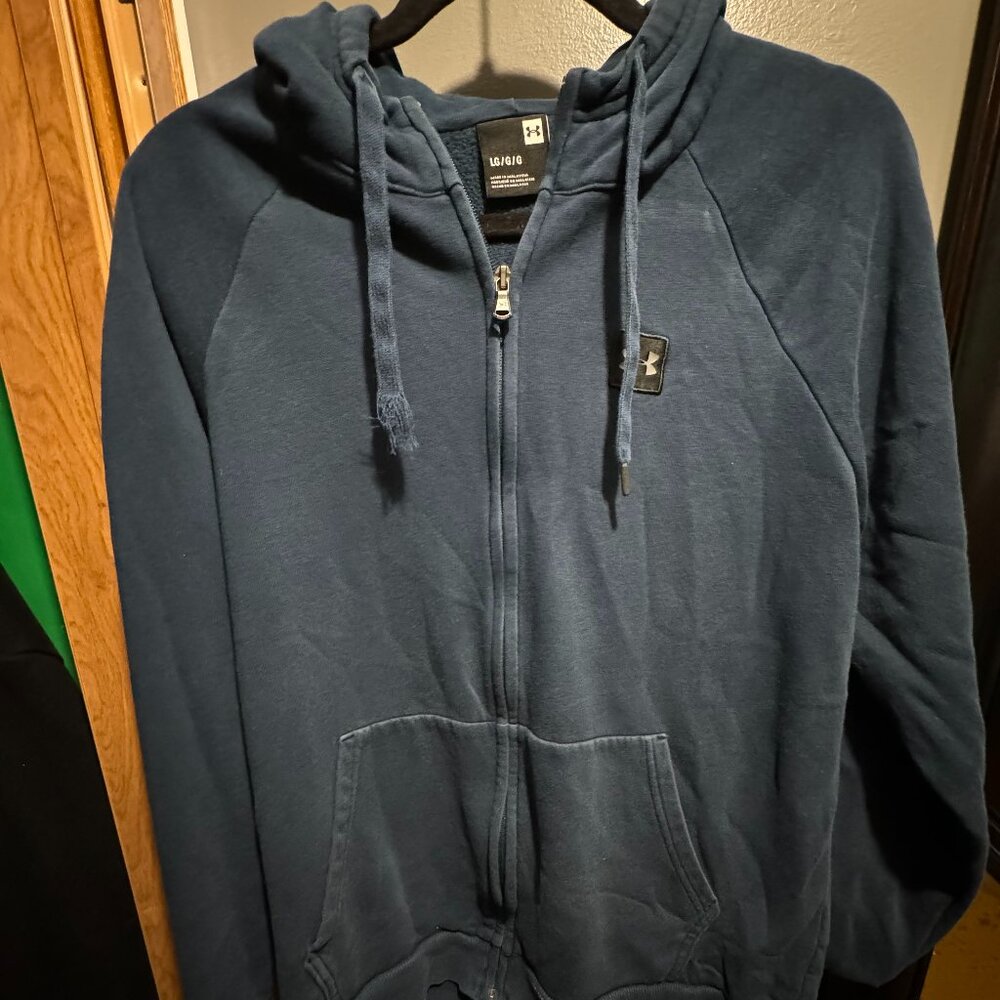 Under Armour hoodie, with missing right aglet.